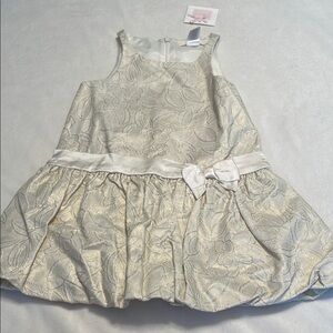 Elegant Cream and Gold Dress with Bow